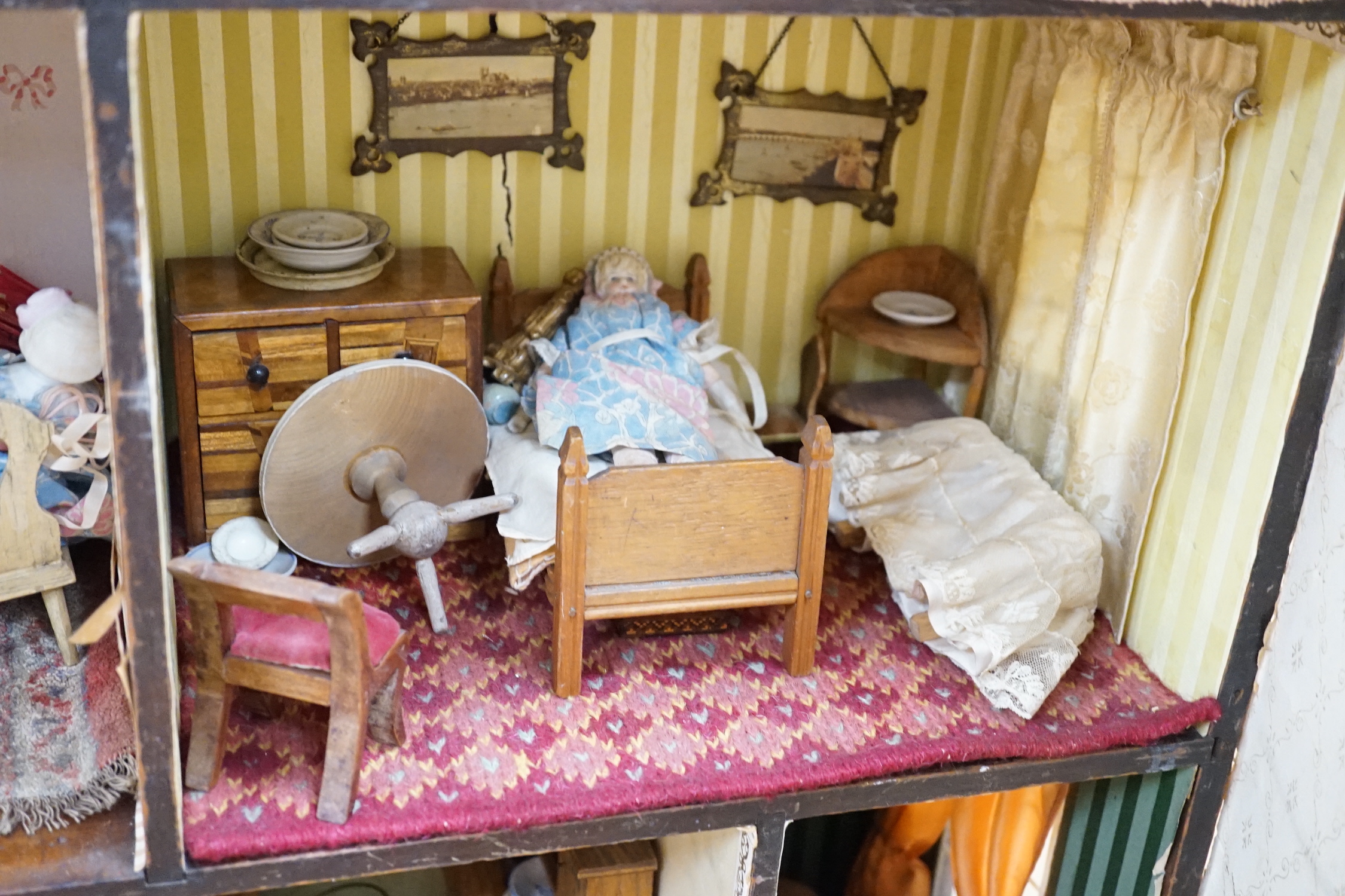 A furnished English dolls’ house, circa 1810-20, 104cm high